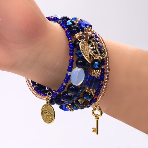 mybeademporium.com Jewelry - Beautiful Royal Blue memory wire bracelet with 6 strands and 4 pendants.